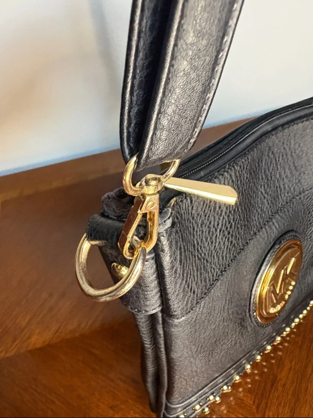 Michael Kors Black Leather Crossbody with Gold MK Medallion